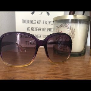 Purple and gold sunglasses